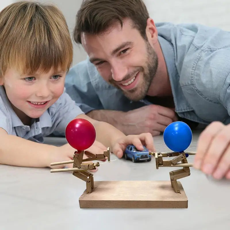 Jeu de dextérité avec ballons et personnages en bois